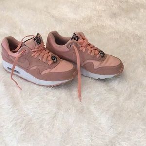 Peachy pink Nike happy tennis shoes